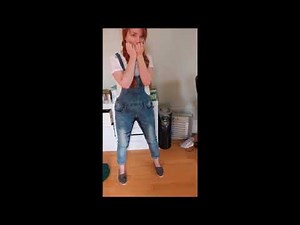 Girl pees in overalls