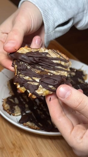 Been making these since freshmen year of college. I used to give some out back then and people loved them so much they wanted me to sell them. Great healthy desert packed with bananas, coconuts and a chocolate drizzle. Equal parts banana to coconut.form into circles poking a hole in the middle and bake at 375 for about 25 min. Pull out drizzle with choclate and freeze. Keep them in the freezer also! #dessertideas #dessert #dessertinspo #desserttok #figapp @Fig App