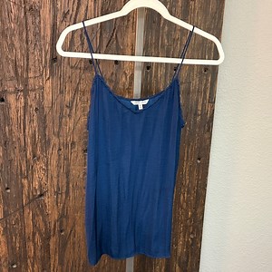 Blue tank top with scalloped detail and spaghetti straps