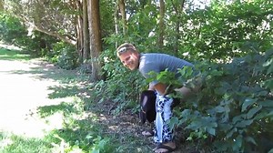 Guy poops un woods