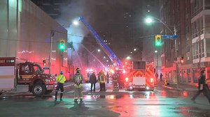 Fire crews tackle four-alarm blaze in Toronto that sent 2 firefighters to hospital