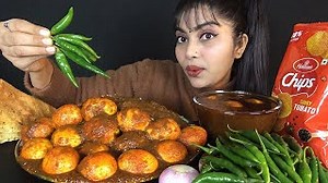 572K views · 9.6K reactions |  EATING KALA BHUNA EGG CURRY WITH...