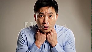 Concerned Man Choking, Asian Male Strangling Himself In Painful Expression And Anguish