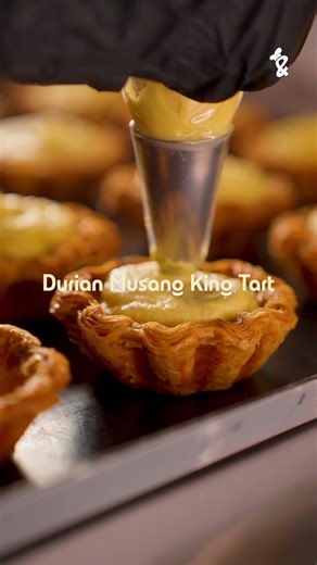 Here’s how the Musang Majesty comes to lift. Layer by layer, from our ultra-crispy tart shell to the rich, creamy 100% Musang King durian filling. . Topped with Musang Gold Leaf, because every king deserves a crown ✨ . Watch the magic. Then taste it yourself. . 🗓 Limited Drop: 1 August to 31 August . Only at Milk & Barley. _________ . The Curve, Mutiara Damansara 📍K-G2B-W, Ground Floor Right across from McDonald's 🕰️ 10am–10pm . Berjaya Times Square 📍K-02-01, 2nd Floor Right across from Mixu