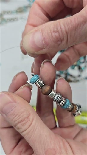Beading Tip for using a 2 hole slider bead as the focal bead in a single beaded design.