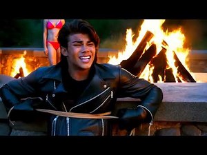young boys in leather clothes burning at the stake