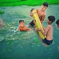 Bathing in River Village