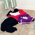 Clothes On Floor in Bathroom