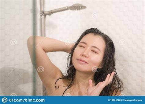 asian showering nude