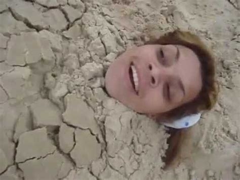 buried in sand blowjob nude