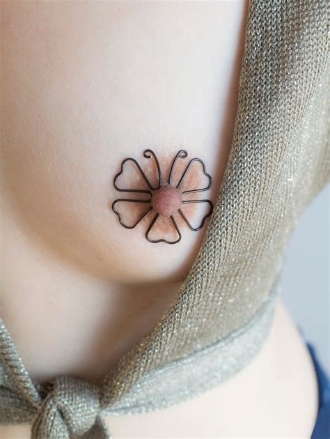 butterfly nipple ring nude
