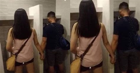 couple peeing together nude