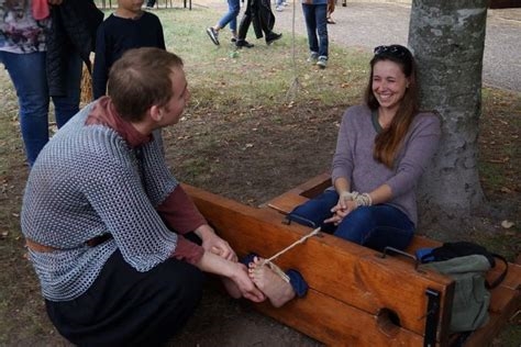 feet tickled in the stocks nude