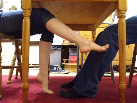 foot worship under table nude