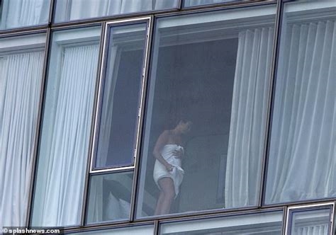 hotel window naked nude