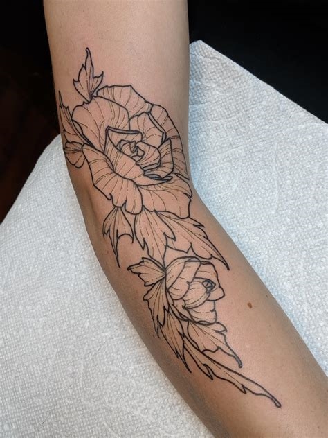 linework rose tattoo nude