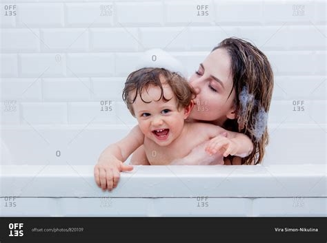 mom helps son bath nude