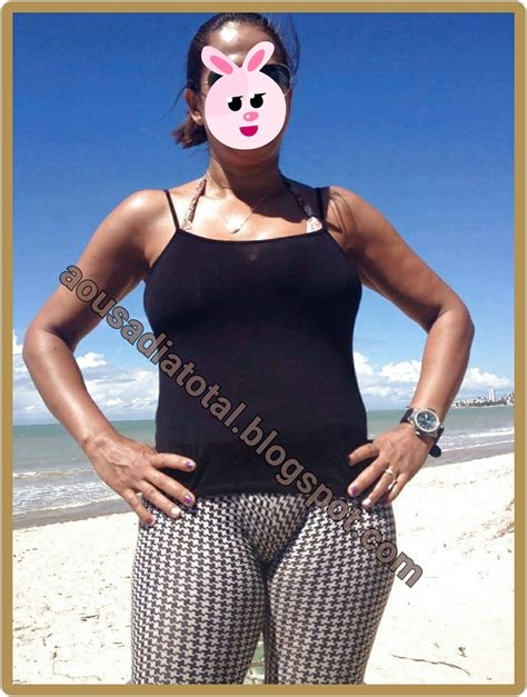 mulher gozando na praia nude