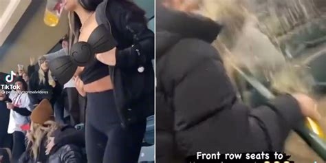woman flashes the crowd at a supercross event nude