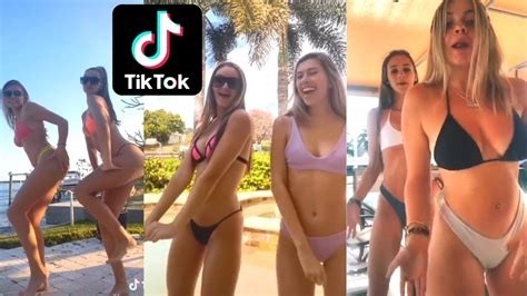 women in bikinis dancing nude
