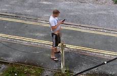 caught street peeing man phone having his while using wee hands spotted bloke star daily