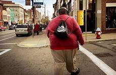 man fat overweight stock walking street videos