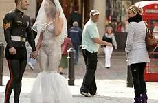 public wedding strip brides bride groom body paint they gmtv chance fight win luxury off painting attention members london celebrities