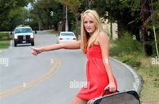 hitchhiking runaway girl young roadway alamy