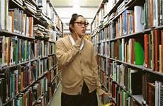 gif books sorting librarian gifs tenor
