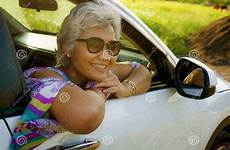 asian indonesian attractive enjoying aged smile sitting middle grey woman happy hair car beautiful her 40s 50s lifestyle relax people