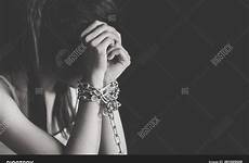 tied slave hands woman