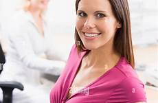 belly coworker pregnant smiling holding alamy woman work