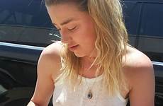 braless amber heard tank top sheer going sunny she wearing into topless unexpected autographs signed
