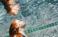 swimming underwater girl pool teenage red hair stock dissolve blend d145