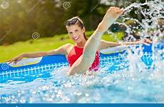 pool woman swimming backyard relaxing attractive close young garden stock relaxation