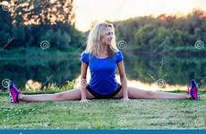 stretching attractive sportswear acrobat practicing twine