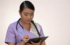 nurse asian clipboard smiling video