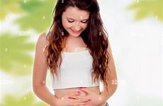 teen belly pregnant touching woman alamy stock wiht leaves background her