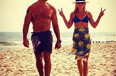 ripa kelly consuelos mark beach bikini husband fit flashes peace sign their she top instagram exception celebrating romance decades rule