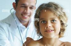 bare doctor chested child examining stethoscope alamy stock
