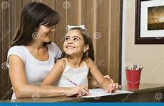 helping daughter mother eye contact stock making homework working royalty