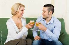young mature woman drinking wine guy comp contents similar search