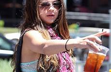 bra selena gomez her flashing shirt flashes ripped blue teen girls girl sexy top running second day wore reveal sleeves