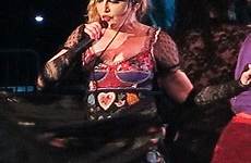 madonna girl pulls fan bare down breast top low fans gone female wild exposes stage dress cut her elsewhere crowds