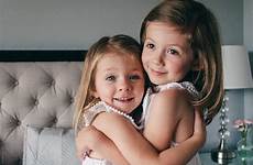 sisters hugging stocksy vincent margaret