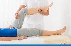 masseur massage leg giving woman preview