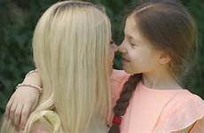 daughter kissing mom little video her portrait elements unavailable currently
