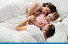 bed family sleeping happy preview