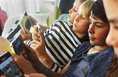 grooming sexting children looking mirror phone