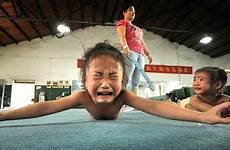 chinese china children kids training torture young gymnastics doing sports girl their gold olympic girls boys gymnasts kid ye punishing